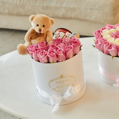 Teddy bear with flowers Stock Illustration by ©Tchumak #69265893