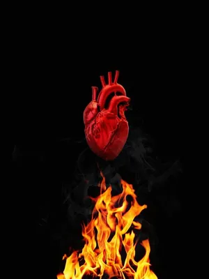 Картинка руки тянутся к огненному сердцу в пламени огня обои на рабочий стол