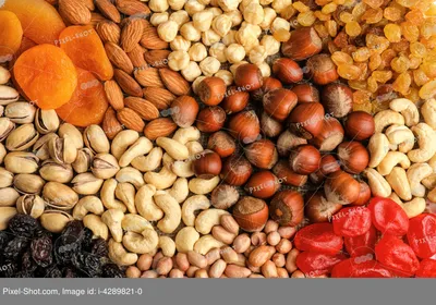 Различные орехи, сухофрукты и ягоды в качестве фона :: Стоковая фотография  :: Pixel-Shot Studio