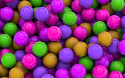 Блестящие Обои на телефон куча разноцветных круглых конфет