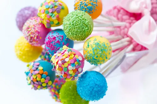Конфеты Обои на телефон группа разноцветных конфет