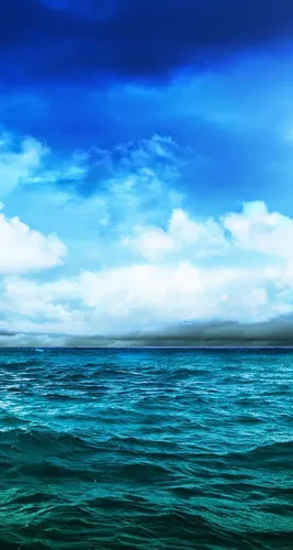 Море Обои на телефон водоем с облаками над ним