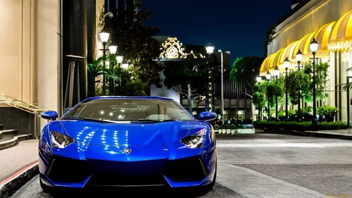 Машины Ламборджини Обои на телефон синий спортивный автомобиль, припаркованный на обочине улицы