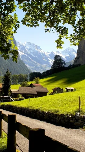 Швейцария Обои на телефон дом в травянистом поле с горами на заднем плане