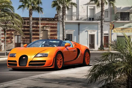 Бугатти Обои на телефон оранжевый спортивный автомобиль, припаркованный на обочине улицы