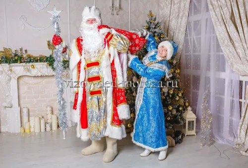 Деда Мороза Картинки пара человек, одетых в одежду