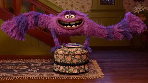 Корпорация Монстров Обои на телефон фигурка фиолетового динозавра на кексе