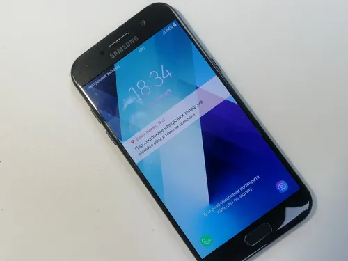 Samsung Galaxy A5 Обои на телефон черный смартфон с синим экраном