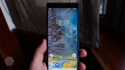 Sony Xperia Обои на телефон рука, держащая телефон