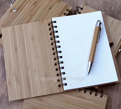 Линованный блокнот, ручка, чашка кофе, корица и кофейные зерна на темном  дереве Stock Photo | Adobe Stock