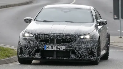 2024 BMW M5 hybrid caught on camera | evo