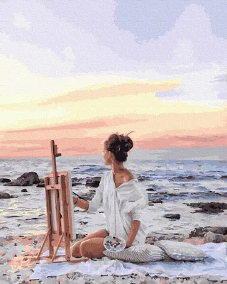 Картинка девушка на берегу моря выпускает птицу Фэнтези Девушки