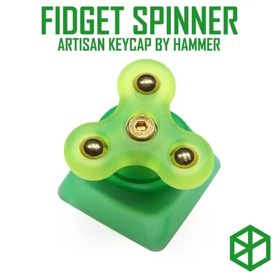 Fidget spinner with pop fidget inside