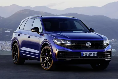 VW Touareg Facelift Rendering Tries To Peel Off Stickers From Spy Shots