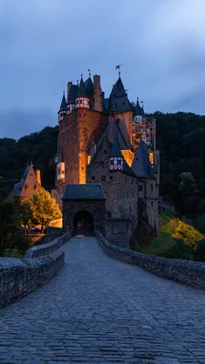 Картинки Германия Burg Eltz замок Леса Дороги Вечер город 1080x1920