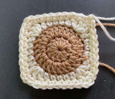 Crochet Smiley Face Pattern In A Granny Square • Free Crochet Pattern