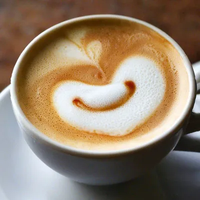 Кофе с большой пенкой с сердечком …» — создано в Шедевруме