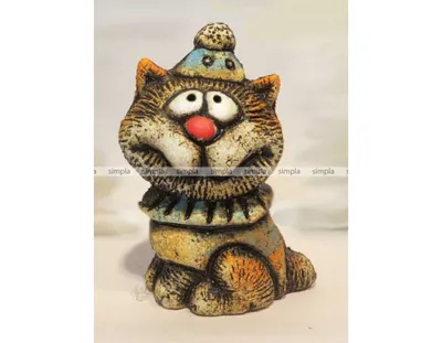 Рыжий кот в шапке-ушанке, сопровождающий хозяина на рыбалке, умилил соцсети  - KP.RU