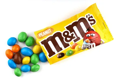 KHARKIV, UKRAINE - JANUARY 2, 2021 M and Ms colorful button shaped  chocolate candies. Multi colored chocolates each of which has the letter m  printed in lower case in white 33544041 Stock Photo at Vecteezy