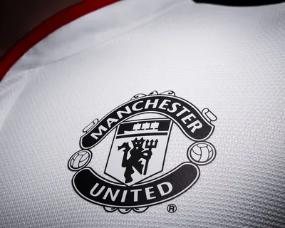 Close-up Of Waving Flag With Manchester United F.C. Football Club Logo  Фотография, картинки, изображения и сток-фотография без роялти. Image  70598787