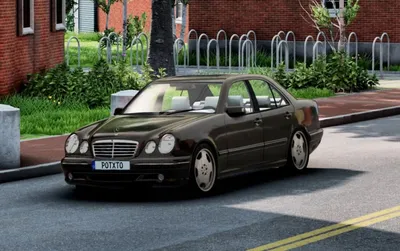 A mercedes benz w210 with lowered suspesion and a widebody kit on Craiyon