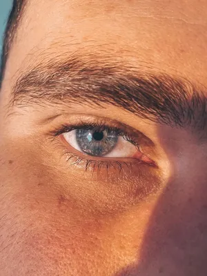 мужской голубой глаз крупным планом Stock Photo | Adobe Stock