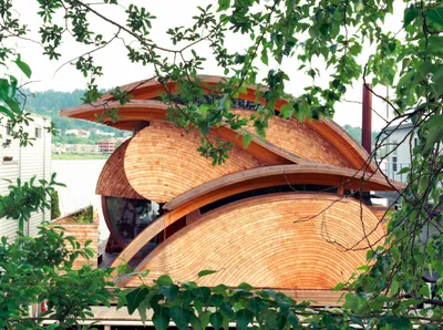 Лентообразный необычный проект дома в Швейцарии
