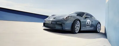 вертикальное фото Porsche 911 Carrera 4s Miami Blue 992 Sports с  пространством для текста вид сзади багажника и фар Редакционное Фото -  изображение насчитывающей привод, порше: 222981926