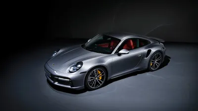 Знаменитого золотого герба Porsche больше не будет на самых мощных моделях.  Компания представила логотип Turbonite и