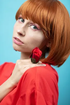 Рыжая девушка с татуировкой Stock Photo | Adobe Stock