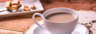 чашка с чаем с блюдцем и ложкой Stock Photo | Adobe Stock