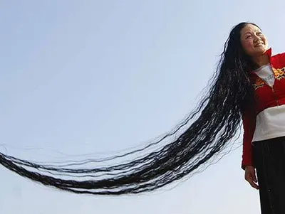 Самые длинные волосы мира: подарок природы или лишняя забота