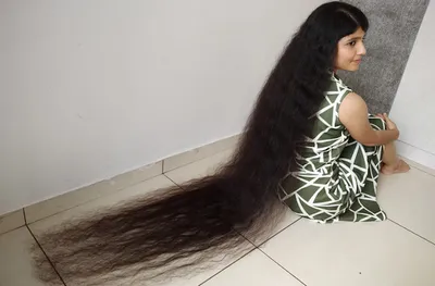 Девушка отрастила самые длинные в мире волосы после неудачной стрижки:  новости, волосы, красота, внешность, рекорд, книга рекордов гиннеса,  общество