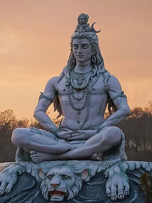 Shiva hindu god sculpture in meditation in the temple 26497524 Stock Photo  at Vecteezy