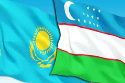 Надпись Узбекистан на руках детей на фоне развевая флага Узбекистана  Стоковое Фото - изображение насчитывающей патриотическо, знамена: 148887762