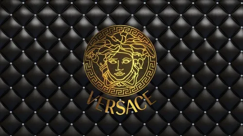 Versace Обои на телефон золотая монета на черной поверхности