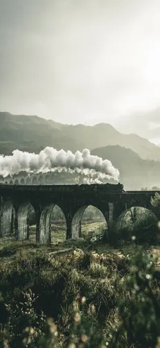 Гарри Поттер Слизерин Обои на телефон каменный мост с дымом, выходящим из него