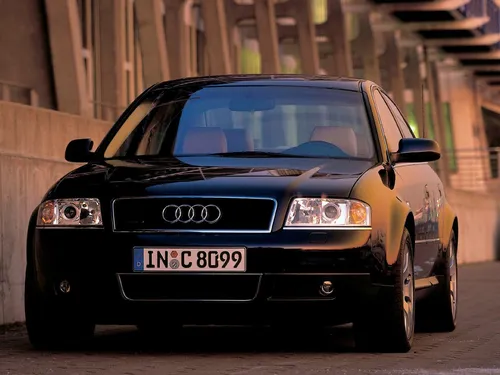 Audi Rs6 Обои на телефон черный автомобиль, припаркованный перед зданием