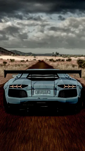 Lamborghini Обои на телефон автомобиль едет по пустынной дороге