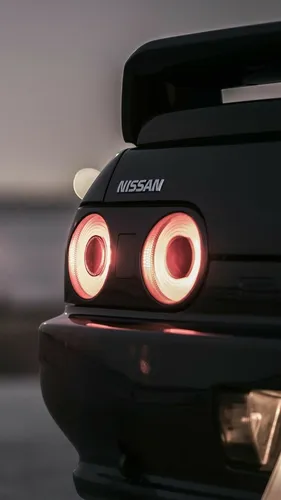 Nissan Skyline R34 Обои на телефон задняя часть черного автомобиля