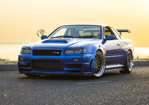 Nissan Skyline R34 Обои на телефон синий автомобиль, припаркованный на дороге