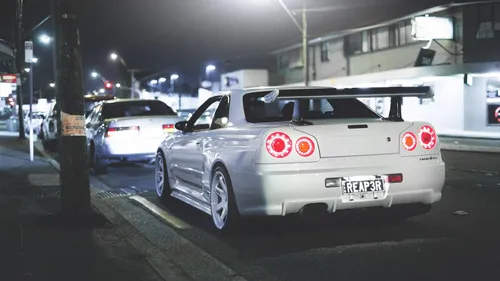 Nissan Skyline R34 Обои на телефон белый автомобиль с красными огнями