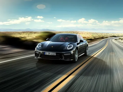 Porsche Обои на телефон черный автомобиль едет по дороге