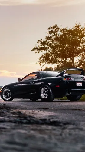 Toyota Supra Обои на телефон черный спортивный автомобиль