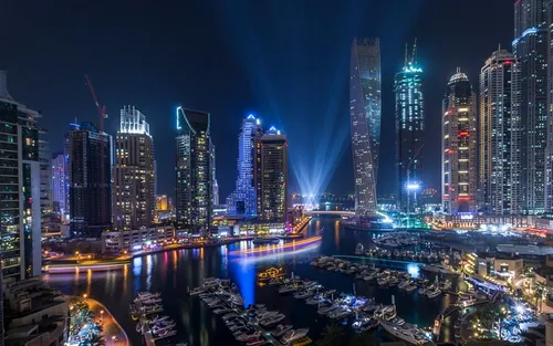Дубай Обои на телефон город с высокими зданиями и водоемом