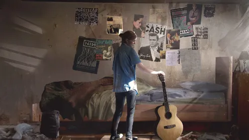 The Last Of Us Обои на телефон мужчина играет на гитаре