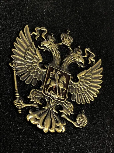 Герб России Обои на телефон предмет из золота и черного металла