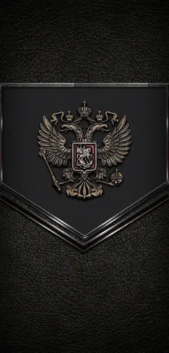 Герб России Обои на телефон металлическая эмблема с птицей и крестом