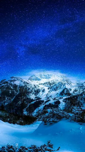 В 4К Обои на телефон снежная гора со звездами в небе