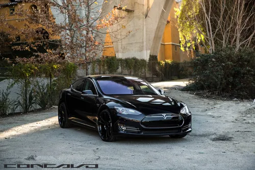 Тесла Обои на телефон черный спортивный автомобиль, припаркованный на улице